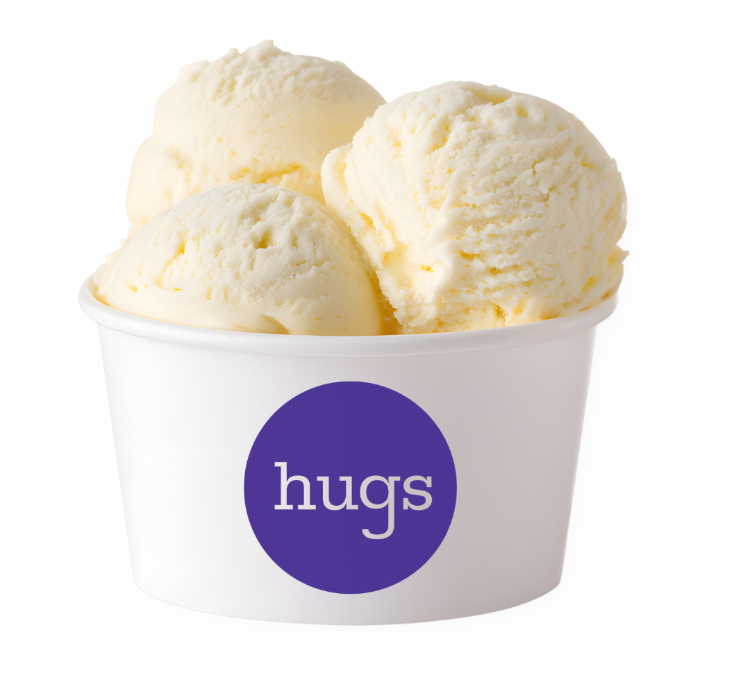 Cup of creamy vanilla ice cream with three scoops, featuring the "hugs" logo, representing Hugs Ice Cream's handcrafted flavors for events and celebrations.